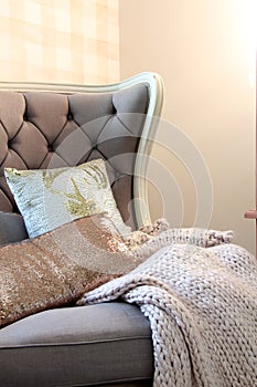 Accent chair with chunky knit blanket photo