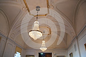 Elegant Crystal Chandeliers hanging in Palace