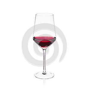 Elegant crystal wine glass isolate on white background with red wine
