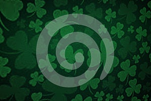 Elegant dark green background with shamrock and old vintage grunge texture. St. Patrick`s Day banner