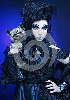 Elegant dark queen with little dog