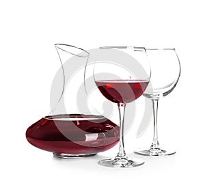 Elegant decanter with red wine and glasse photo