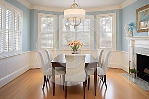 elegant dining room in colonial revival with bay windows