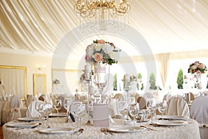 Elegant dinner table with flower decoration