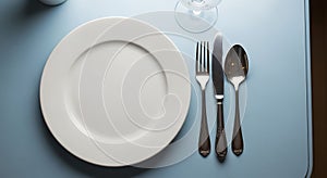 Elegant Empty Place Setting with White Plate and Silverware