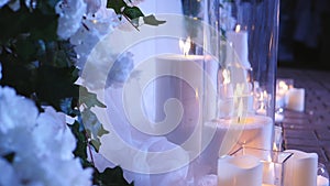 Elegant, evening decor prepared for a luxurious holiday. Decorated for the wedding with flowers.