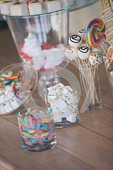 Elegant fancy modern vintage simple tasty sweet table at an upscale wedding