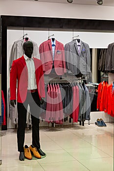 Elegant fashion store, men`s suits for sale at a shopping mall