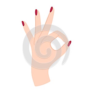 Elegant female hand with a sign approx. Okay gesture. Arm with wrist and fingers of a white woman. Non-verbal language