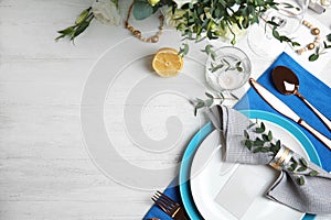 Elegant festive table setting on white background, flat lay. Space for text