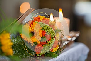 Elegant Floral Arrangement with Candles on Festive Table