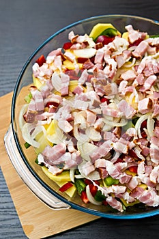 Elegant food photo of potato, pork and bacon baked dish