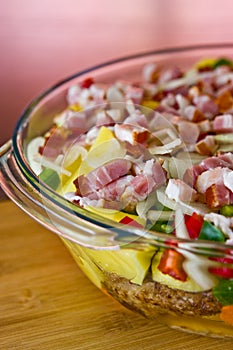 Elegant food photo of potato, pork and bacon baked dish