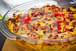 Elegant food photo of potato, pork and bacon baked dish