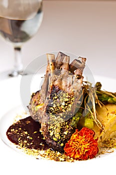 Elegant food photo of ribs served on white plate