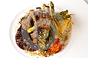 Elegant food photo of ribs served on white plate