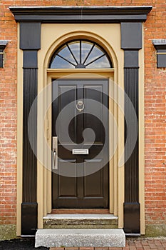 Elegant Front Door in a Brick Building