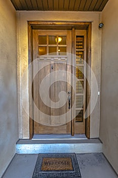 Elegant front door with a welcome mat