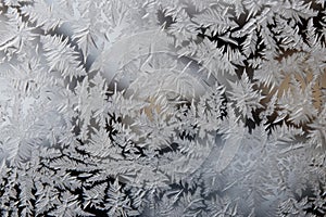 Elegant frosted glass design with intricate frost patterns for background or texture