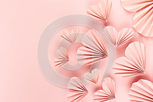 Elegant gentle Valentine day background with sweet pink origami paper hearts fly on soft light pastel pink background, sideways.