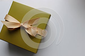 Elegant Gift Box On A White Surface Top View Concept Photo For Greeting Cards Or Holiday Backgrounds