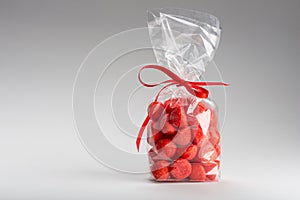 Elegant gift of candy strawberries with copy space