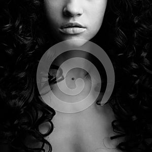 Elegant girl with curly hair