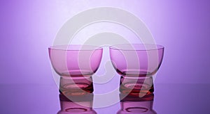 Elegant glassware displayed on mesmerizing glowing gradient background