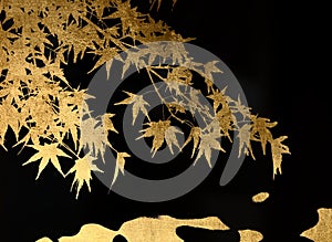 Elegant gold leaf pattern on black background.