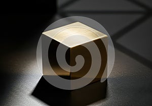 Elegant golden cube object casting dramatic shadow on dark textured surface