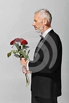 elegant good looking mature man in