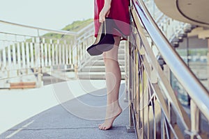 Elegant graceful glamour relax balcony railings urban getaway vogue design girlish feminine pedicure concept. Side half profile c