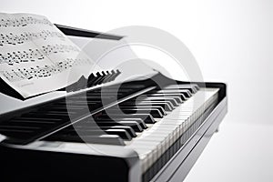 Elegant grand piano with sheet music isolated on white background. Close up. Ai generative