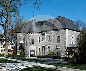 Elegant Gray Stone Mansion with Round Turret