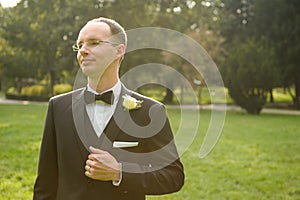 Elegant groom posing