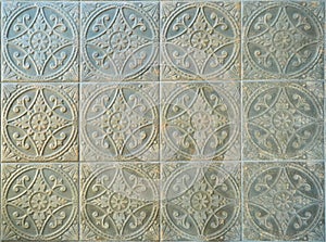 Elegant historical ceramic tiles on the floor and walls of the building.