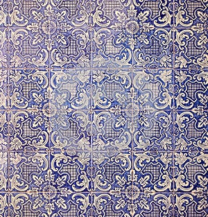 Elegant historical ceramic tiles on the floor and walls of the building.