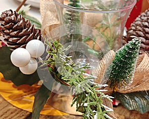 Elegant Holiday Dinner Table Setting with Rustic Christmas Decorations