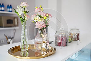 Elegant home decor with flowers and gold accents