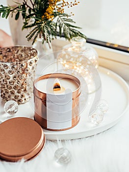 Elegant home decoration with wooden wick burning candle