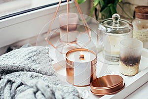 Elegant home decoration with wooden wick burning candle