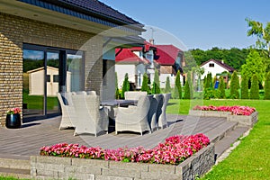 Elegant home terrace with garden furniture