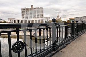 Elegant iron wrought fence of the Novoarbatskiy bridge. The House of the Government of the Russian Federation, Moscow, Russia.