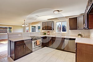 Elegant kitchen with stained cabinets.