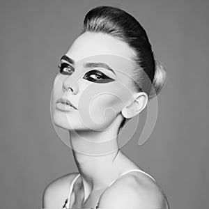 Elegant lady with art makeup