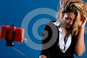 Elegant lady studies poses for image-based social media photo