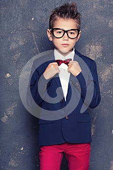 Elegant little boy in suit.