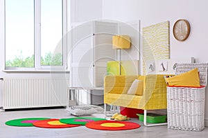 Elegant living room interior with comfortable sofa. Idea for home design in rainbow colors