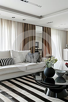 Elegant living room interior with striped wall and classic furniture