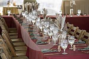 Elegant long table set up for an outdoor wedding reception